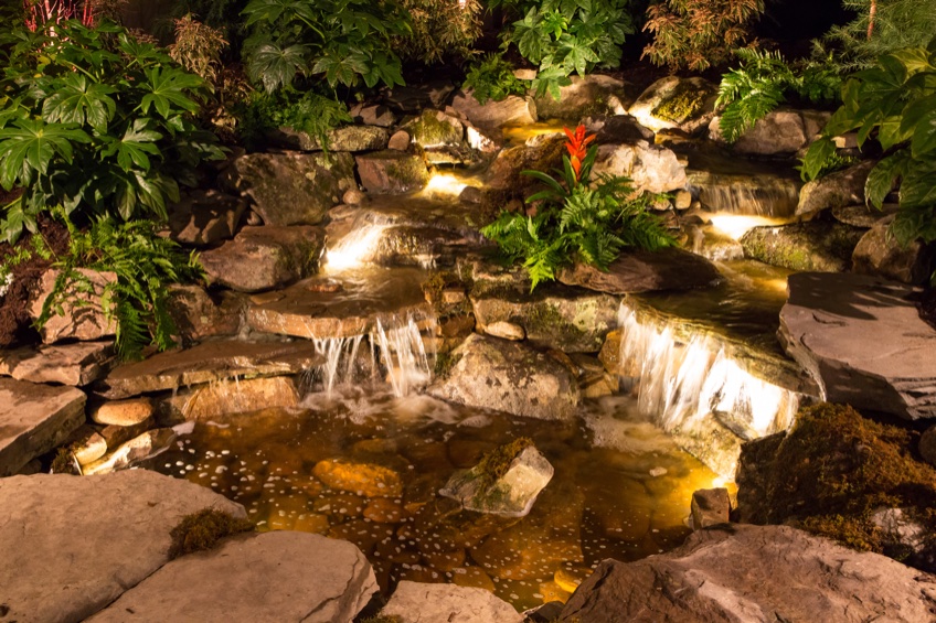 lights emphasizing waterfall features